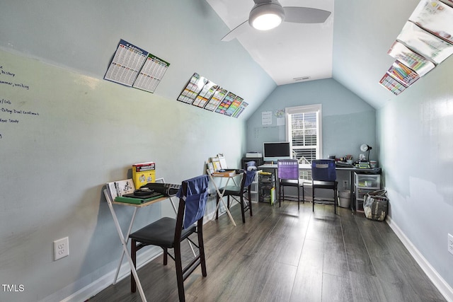 home office with vaulted ceiling, dark wood-type flooring, and ceiling fan