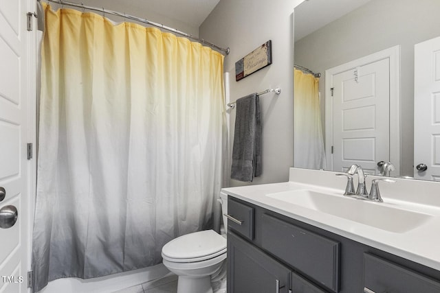 bathroom with vanity, toilet, and curtained shower