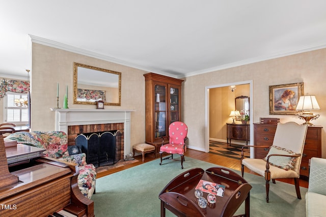 living room featuring crown molding, a brick fireplace, and hardwood / wood-style flooring