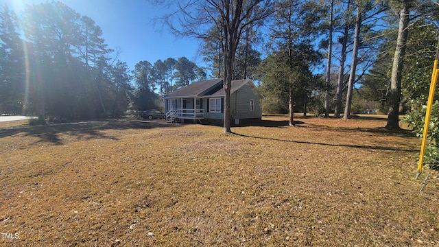 view of yard featuring covered porch