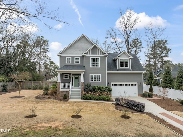 craftsman-style home with a garage and a porch