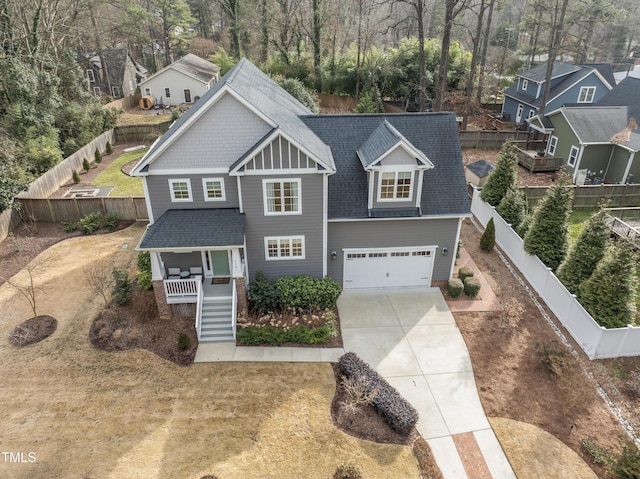 view of front of home featuring a garage and covered porch