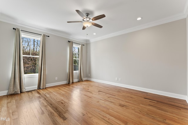 unfurnished room with crown molding, ceiling fan, and light wood-type flooring