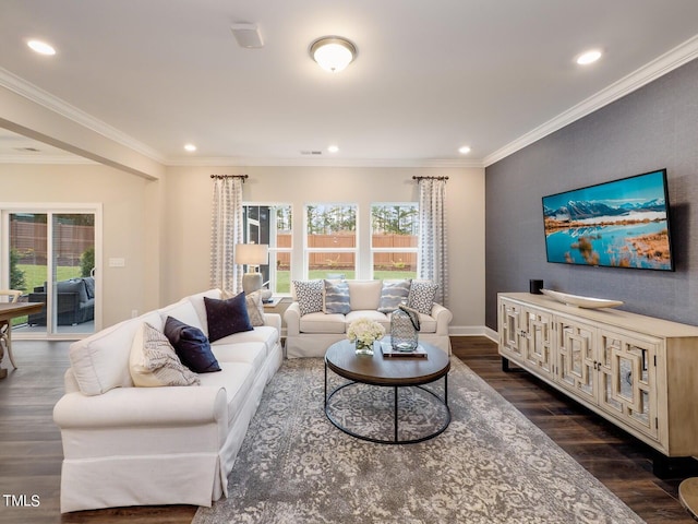 living room with dark wood-type flooring and ornamental molding