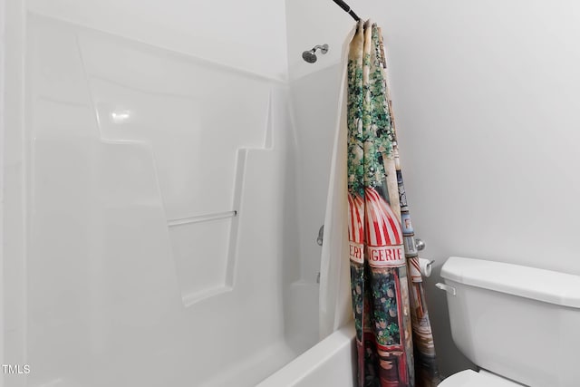 bathroom with shower / bathtub combination with curtain and toilet