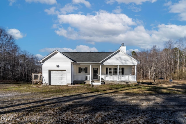 ranch-style home featuring a porch and a garage