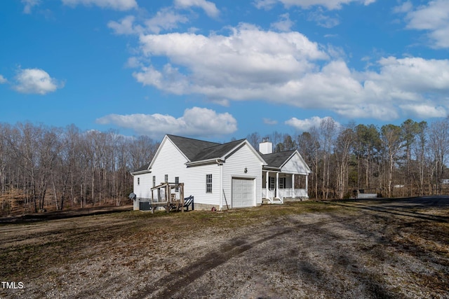 view of property exterior featuring a garage