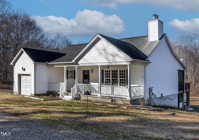 view of front of property with a porch and a garage