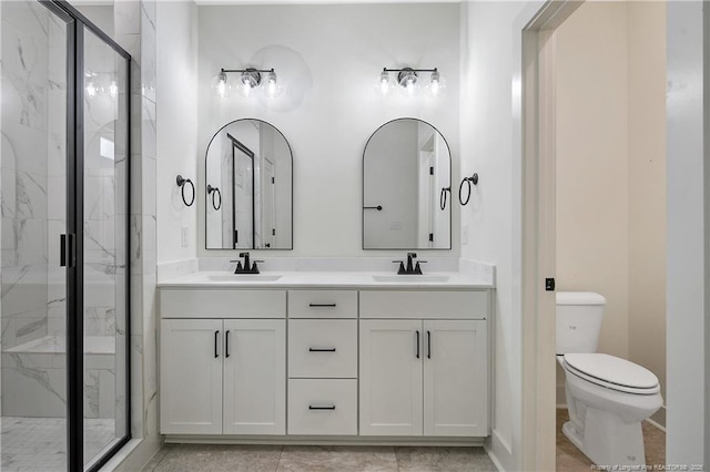 4921 High Branch Ct, Stedman, NC 28391 - bathroom with a marble finish shower, toilet, a sink, and double vanity