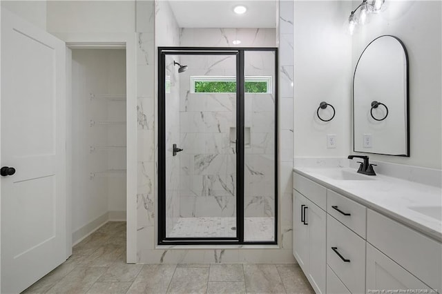 4921 High Branch Ct, Stedman, NC 28391 - full bath featuring double vanity, a marble finish shower, baseboards, and a sink