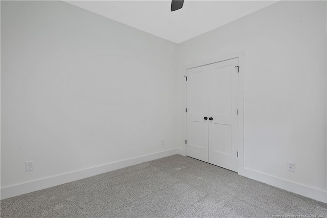 4921 High Branch Ct, Stedman, NC 28391 - spare room with baseboards, a ceiling fan, and carpet floors