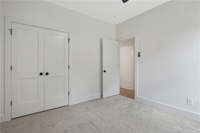 4921 High Branch Ct, Stedman, NC 28391 - unfurnished bedroom featuring a closet, baseboards, and carpet floors