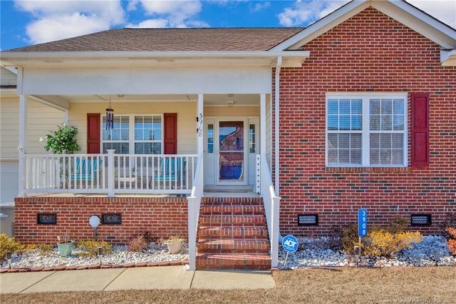 view of front of home featuring covered porch