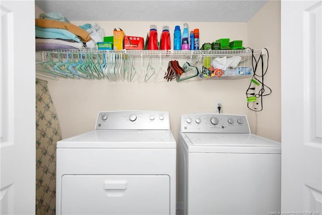 laundry room with separate washer and dryer