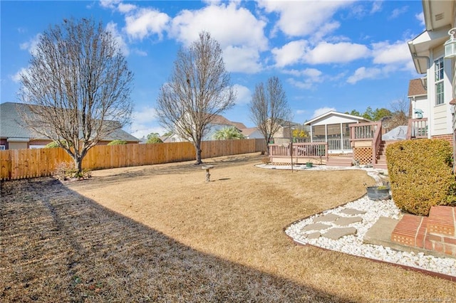 view of yard with a deck