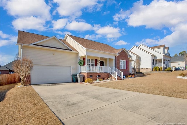 ranch-style home with a porch, a garage, and a front yard