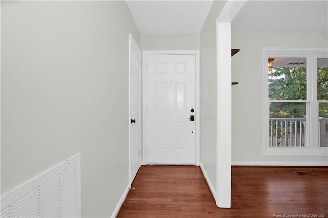 entryway with wood-type flooring