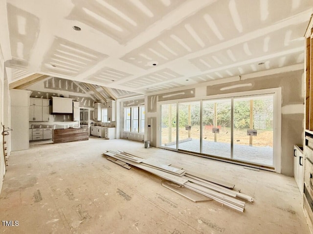 miscellaneous room with vaulted ceiling