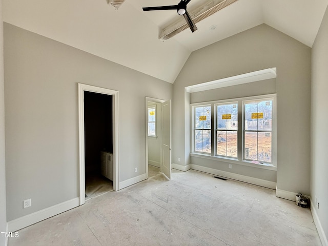 unfurnished bedroom with vaulted ceiling, multiple windows, baseboards, and visible vents