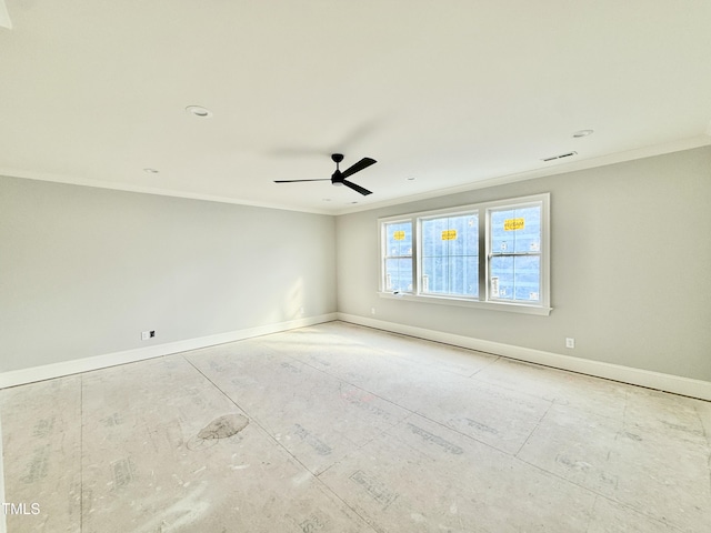 empty room featuring a ceiling fan, crown molding, visible vents, and baseboards