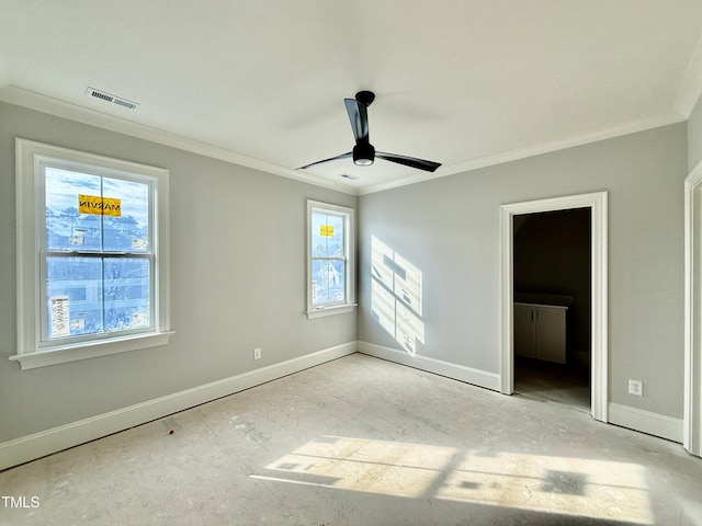 unfurnished bedroom with visible vents, baseboards, and ornamental molding