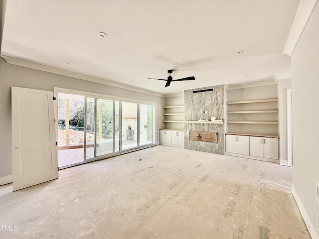 unfurnished living room with a fireplace, baseboards, crown molding, and a ceiling fan