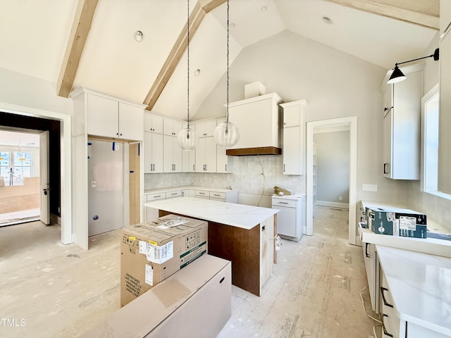 kitchen with backsplash, a center island, pendant lighting, white cabinets, and high vaulted ceiling