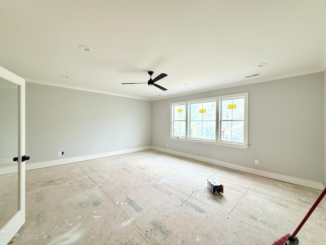 empty room featuring a ceiling fan, baseboards, crown molding, and visible vents