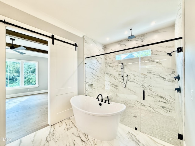 5820 Shawood Dr, Raleigh, NC 27609 - full bath with a marble finish shower, a freestanding tub, and marble tiled flooring