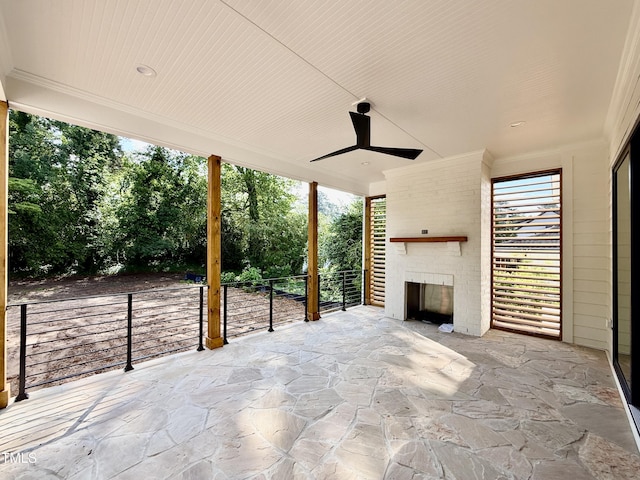 5820 Shawood Dr, Raleigh, NC 27609 - view of patio / terrace featuring a large fireplace