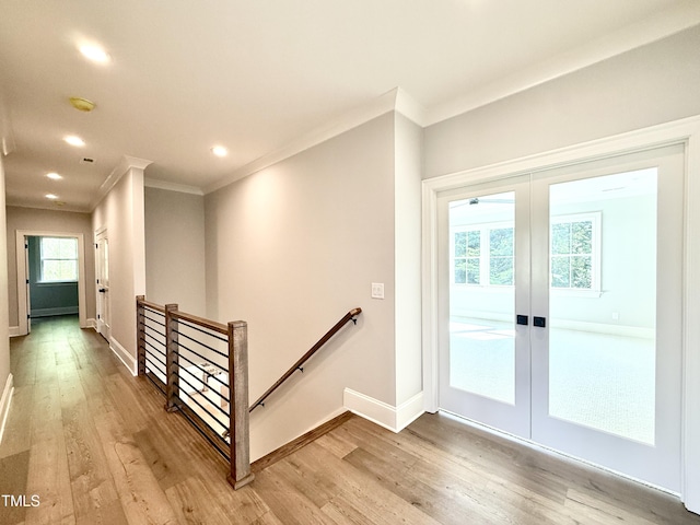 5820 Shawood Dr, Raleigh, NC 27609 - doorway with ornamental molding, light wood finished floors, baseboards, recessed lighting, and french doors