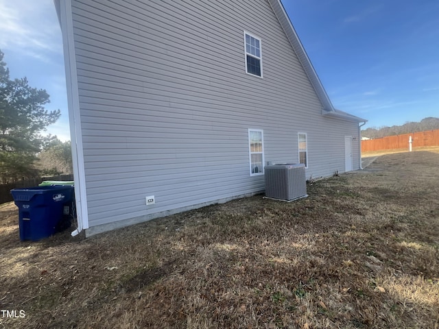 view of home's exterior with central AC unit