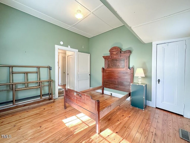 bedroom featuring light wood-type flooring