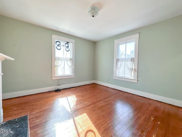 empty room featuring hardwood / wood-style floors