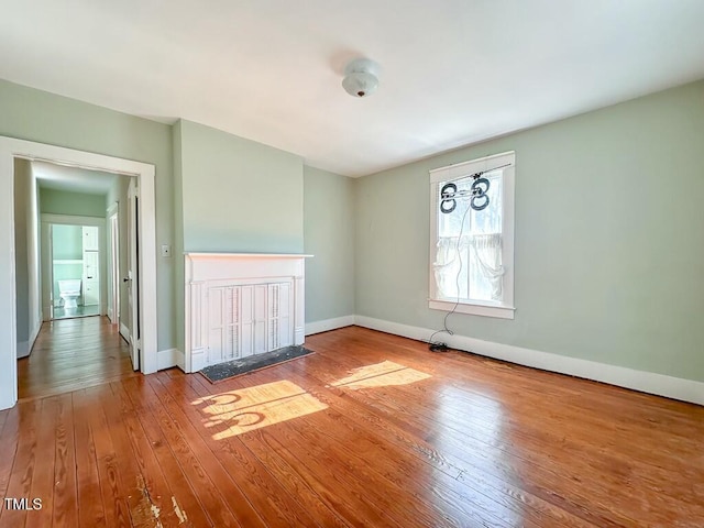 unfurnished room with light hardwood / wood-style flooring