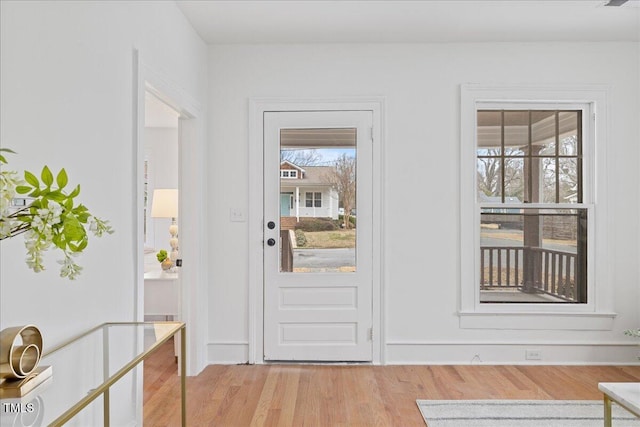 foyer entrance featuring light hardwood / wood-style flooring