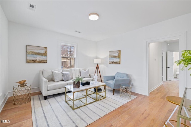 living room with light wood-type flooring