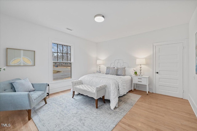 bedroom featuring light wood-type flooring