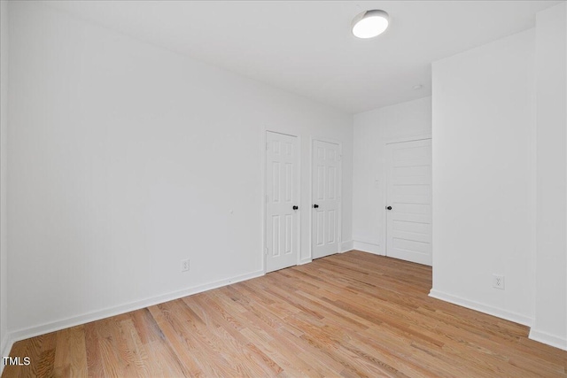 empty room featuring light hardwood / wood-style floors