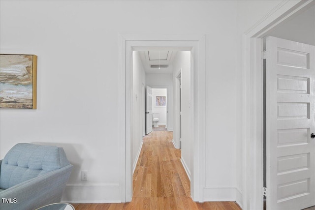 hallway with light wood-type flooring