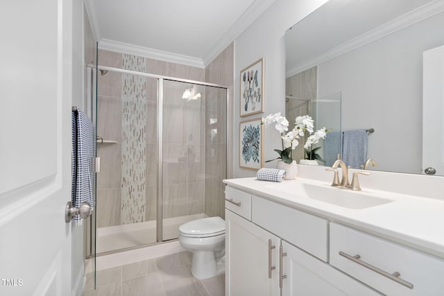 bathroom featuring ornamental molding, walk in shower, vanity, and toilet