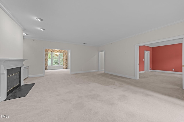 unfurnished living room featuring light carpet and crown molding