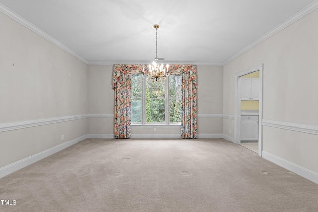 carpeted empty room with an inviting chandelier and ornamental molding