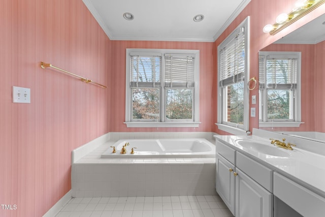 bathroom with tile patterned flooring, vanity, tiled bath, and crown molding