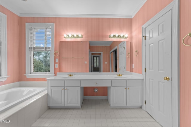 bathroom featuring tiled tub, vanity, tile patterned floors, and crown molding