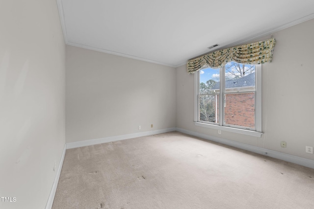 empty room with light carpet and ornamental molding