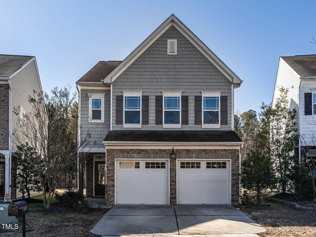 craftsman inspired home with a garage