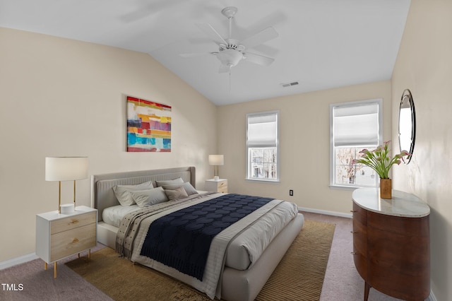 bedroom with vaulted ceiling, ceiling fan, and carpet