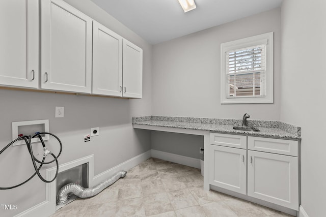 clothes washing area with washer hookup, sink, cabinets, and electric dryer hookup