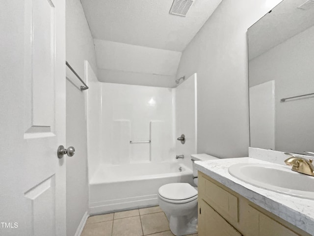 full bathroom with shower / washtub combination, vanity, vaulted ceiling, tile patterned floors, and toilet